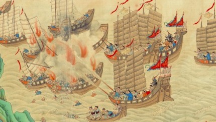 Historic naval battle scene depicting traditional wooden sailing ships engaged in battle at sea.