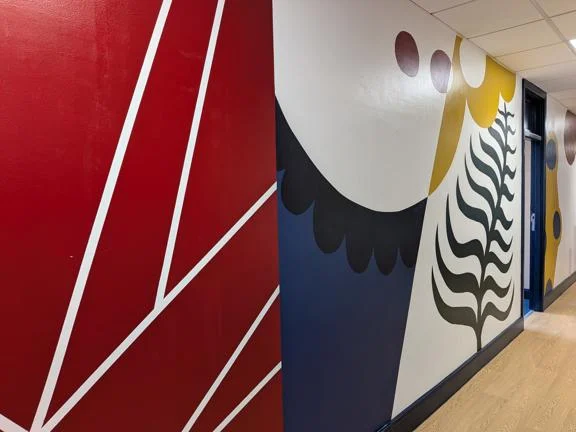 Mural by Paint the Change in the new GSoS office