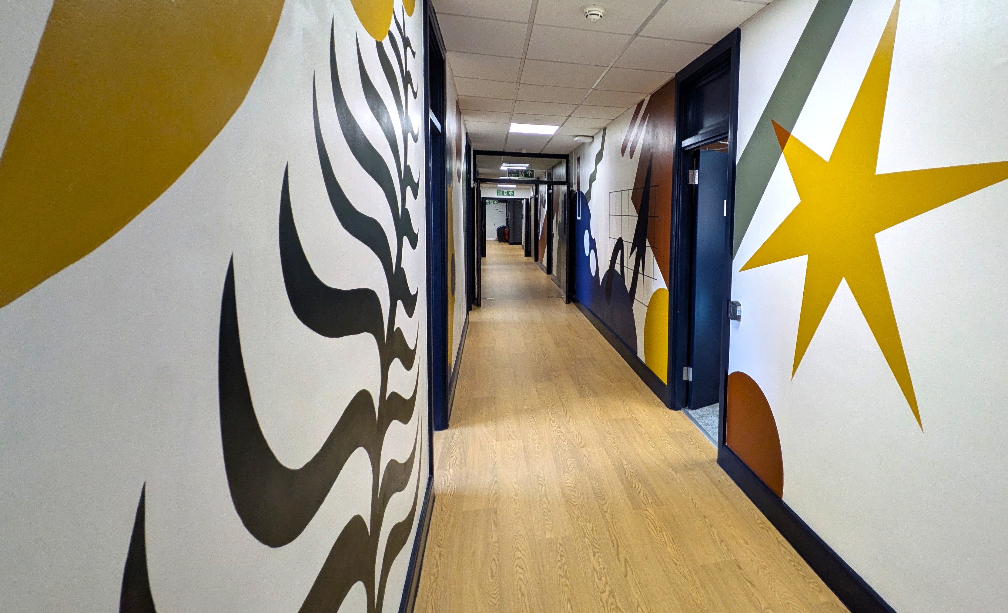 Mural by Paint the Change in the new GSoS office