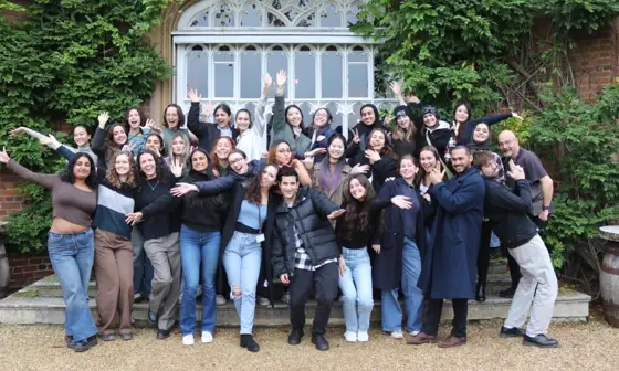 Group photo of MSc International Development and Humanitarian Emergencies Students outside of Cumberland Lodge.