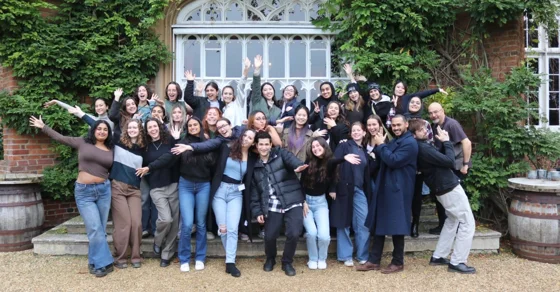 Group photo of MSc International Development and Humanitarian Emergencies Students outside of Cumberland Lodge.