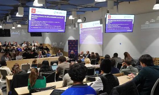 A panel of 5 people presenting to an audience in an LSE lecture theatre.