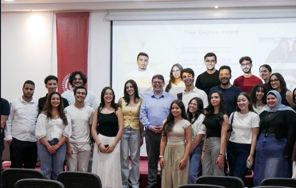 Baya with fellow students and Dr James Abdey during one of his visits to Carthage Business School