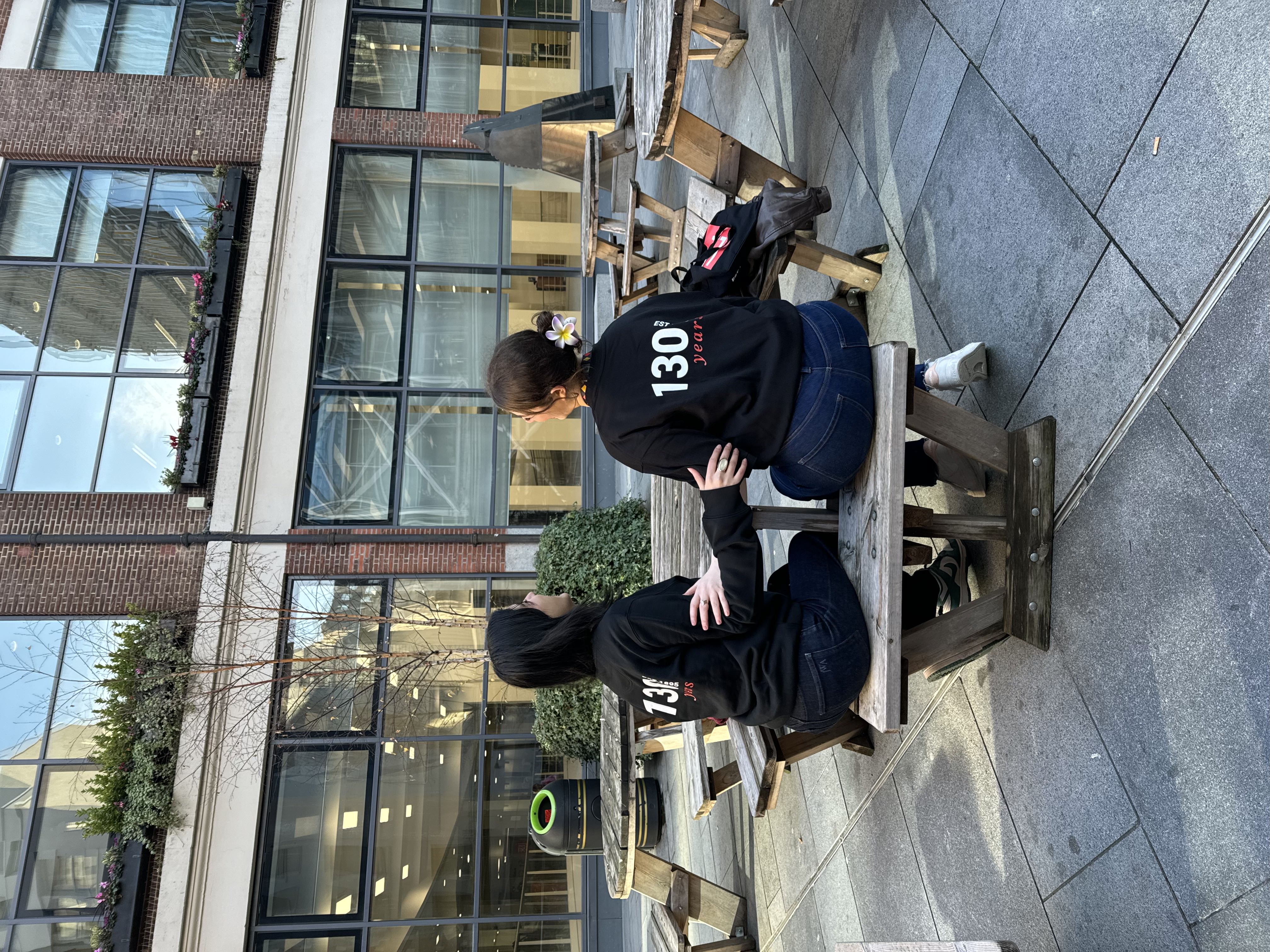 two students wearing LSE 130 jumpers