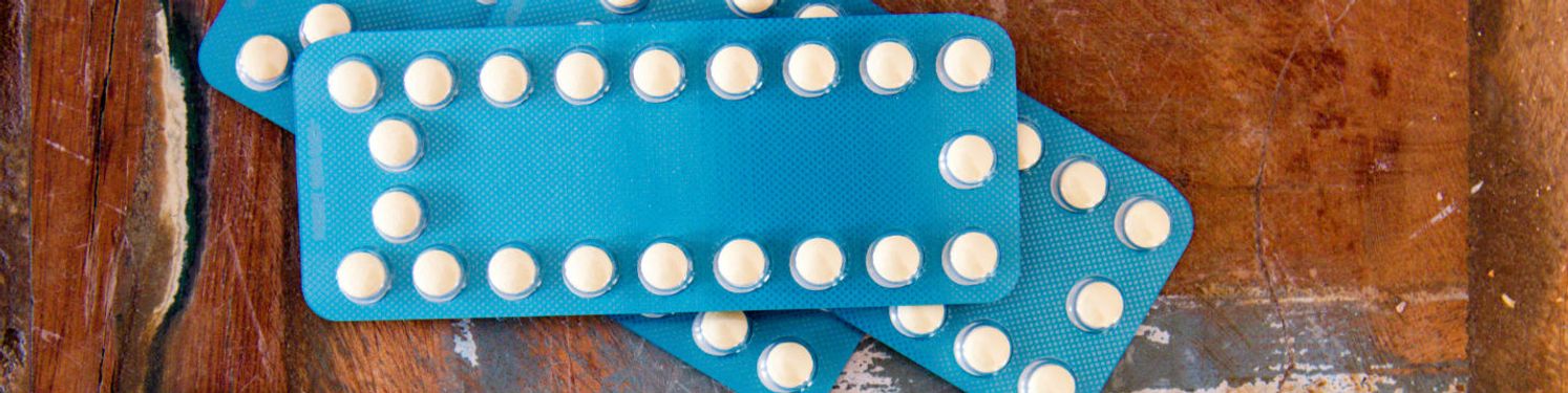 A pile of contraceptive pills in their package