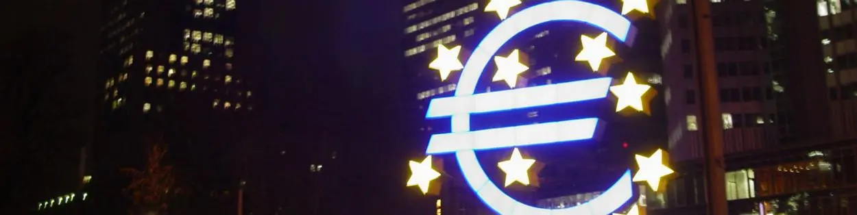 A large Euro sign on a building