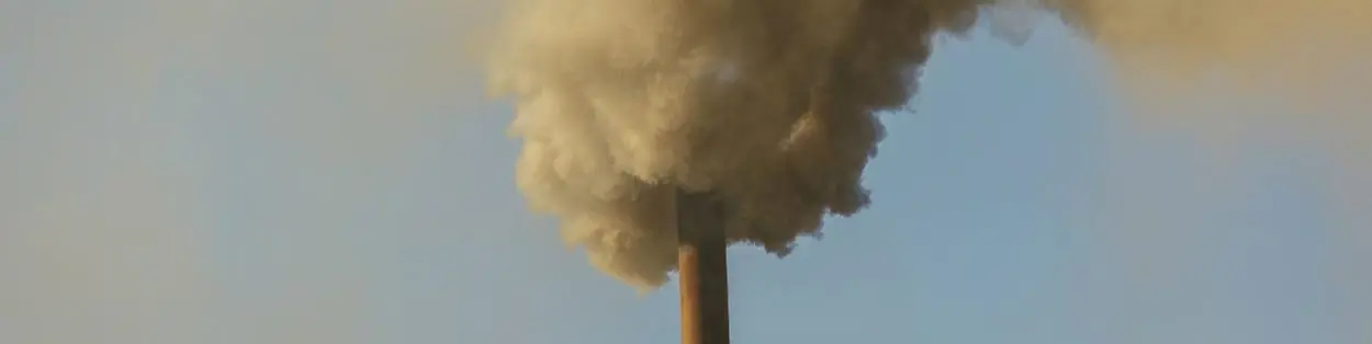 pollution coming out of a tall tower