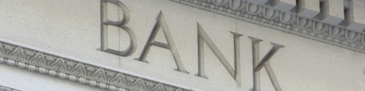 a building facade with the word 'bank' etched into the stone