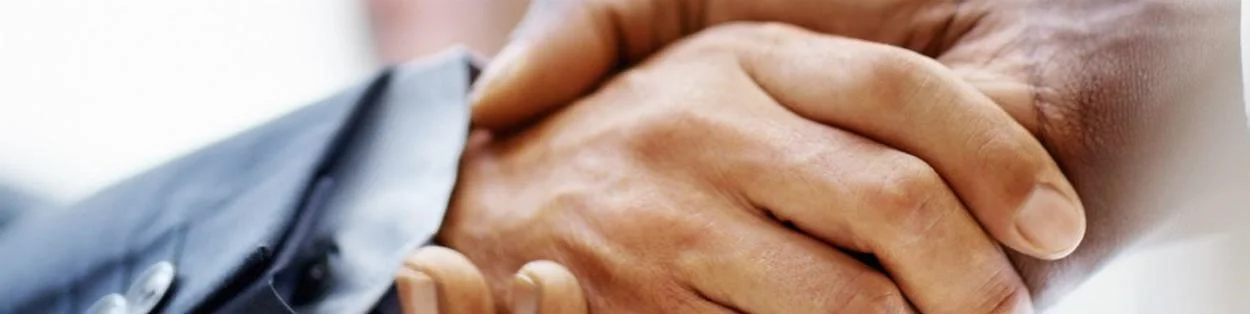 two men shaking hands