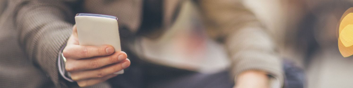 a man using a mobile phone