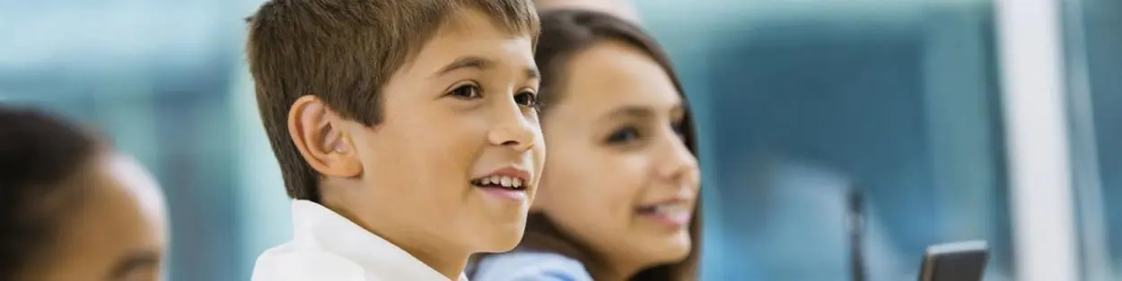 two children in a classroom