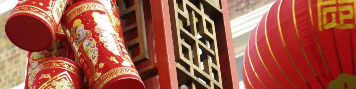 red lanterns hanging from a building for chinese new year