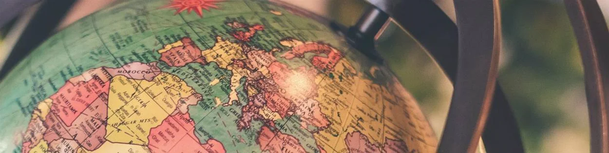 A globe map of Europe.