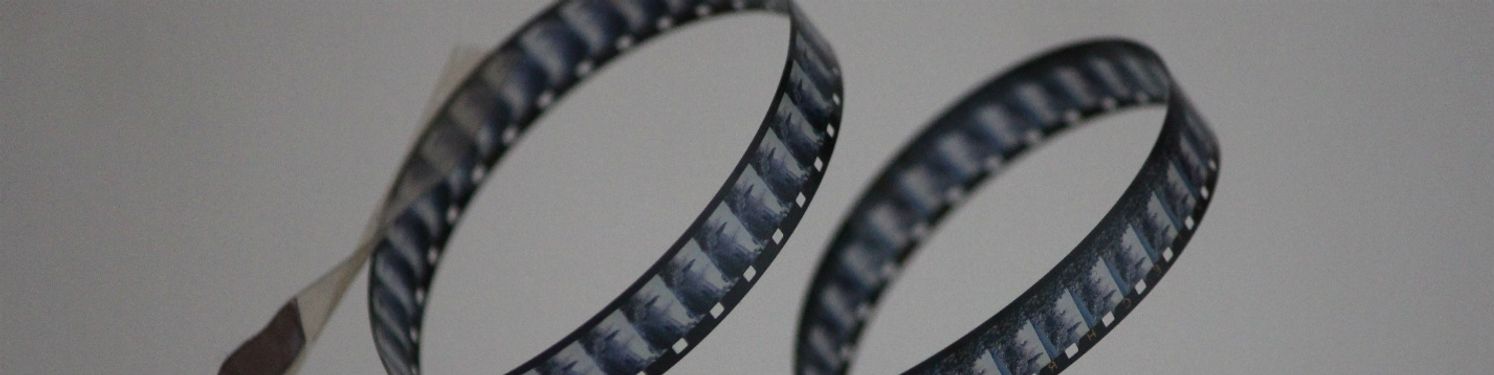 A reel of film curled into a loop