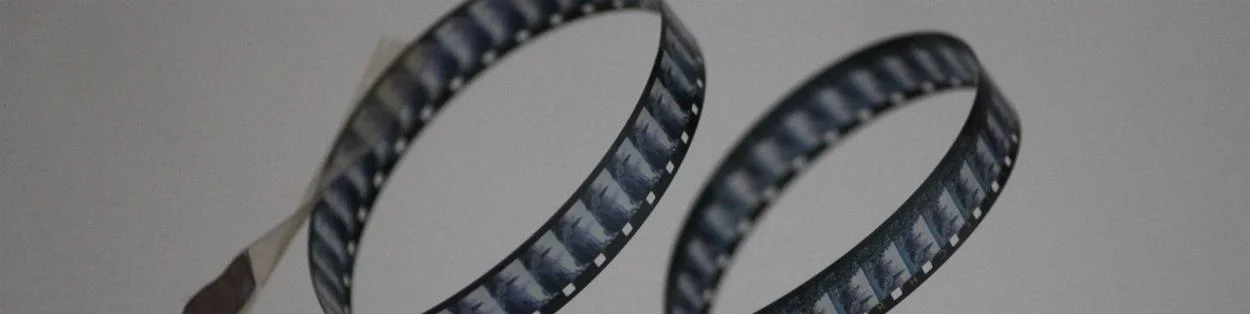 A reel of film curled into a loop
