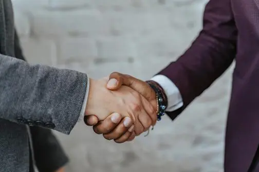 Handshake. Photo by Pexels