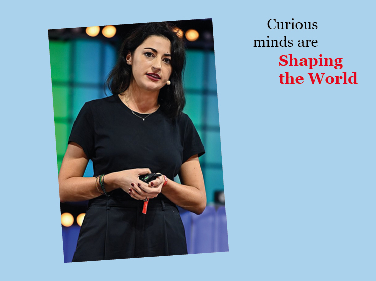 Blue graphic with an image of Lubomila Jordanova and the text "Curious minds are shaping the world"