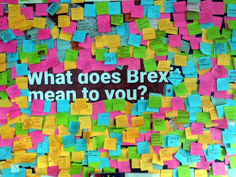 The Brexit wall - a wall of post-it notes where people written responses to the question about what Brexit means to them.
