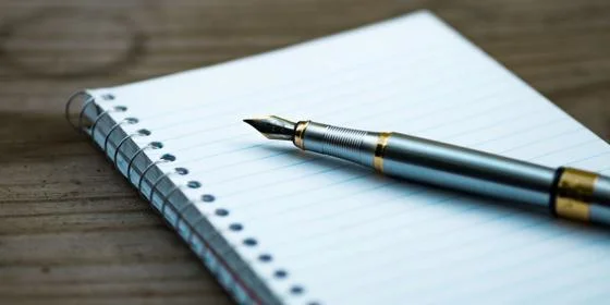 notepad and pen