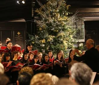 A group of carol singers at a Christmas concert