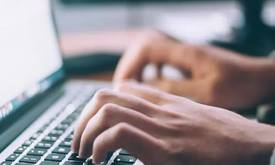 laptop fingers typing