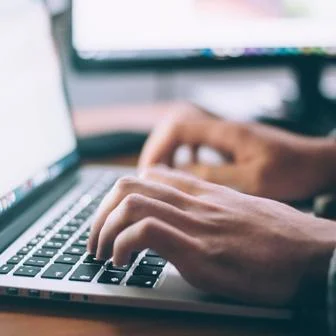 laptop fingers typing
