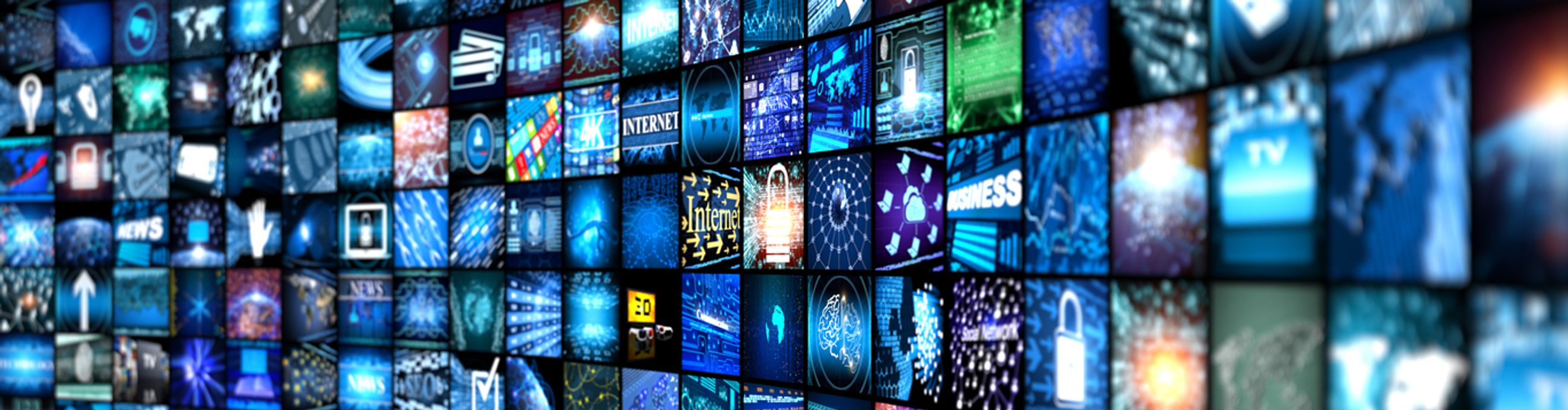 Wall of TV screens curving away