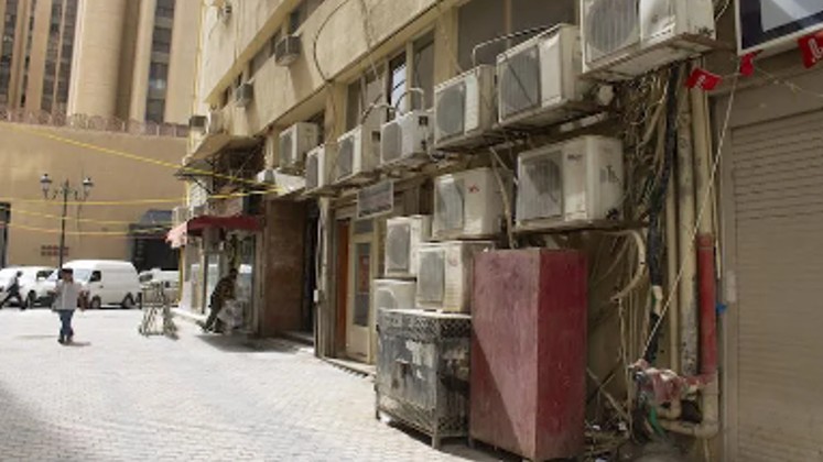 Air conditioner units on a wall 