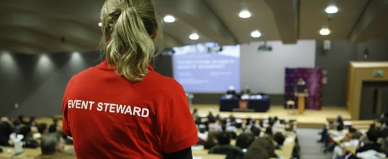 LSE Events steward in a full Sheikh Zayed Theatre