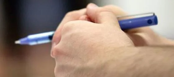 Hand holding pen