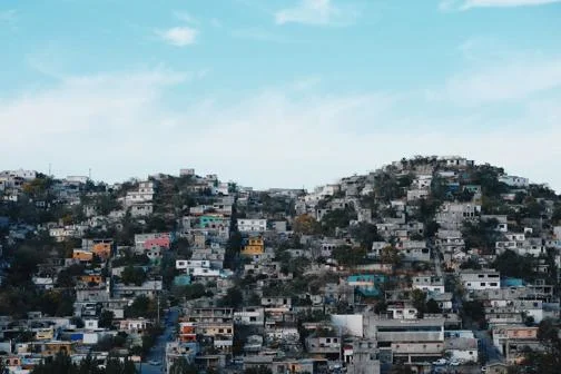 dense, low-quality housing on a hill