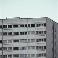 Top of grey high-rise building