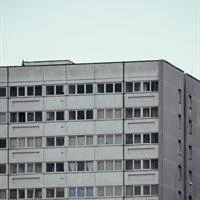 Top of grey high-rise building