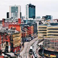 City with tall buildings and busy road