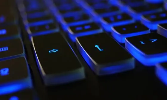 image of keyboard back lit with a blue light