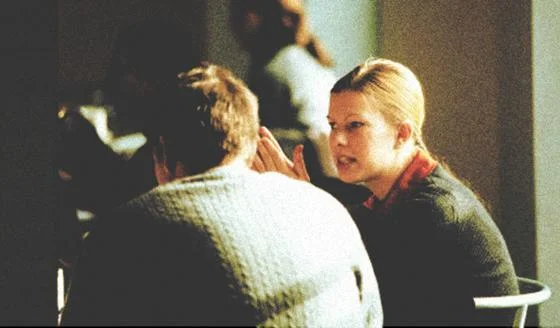 Two people talking