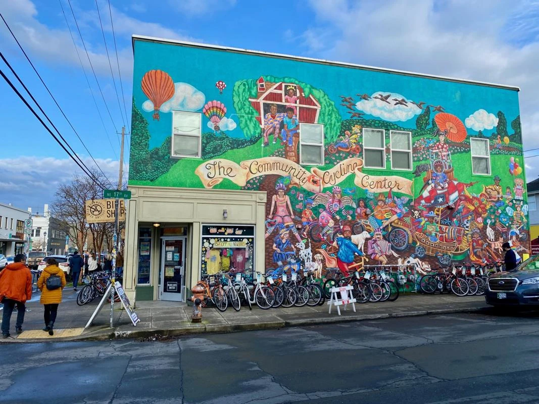 A cycle shop in Oregon, USA with colourful artwork on the wall