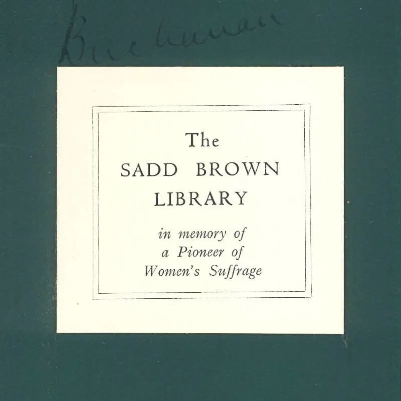 A bookplate stuck to the inside cover of a book. It reads as follows: The Sadd Brown Library in memory of a pioneer of women's suffrage.