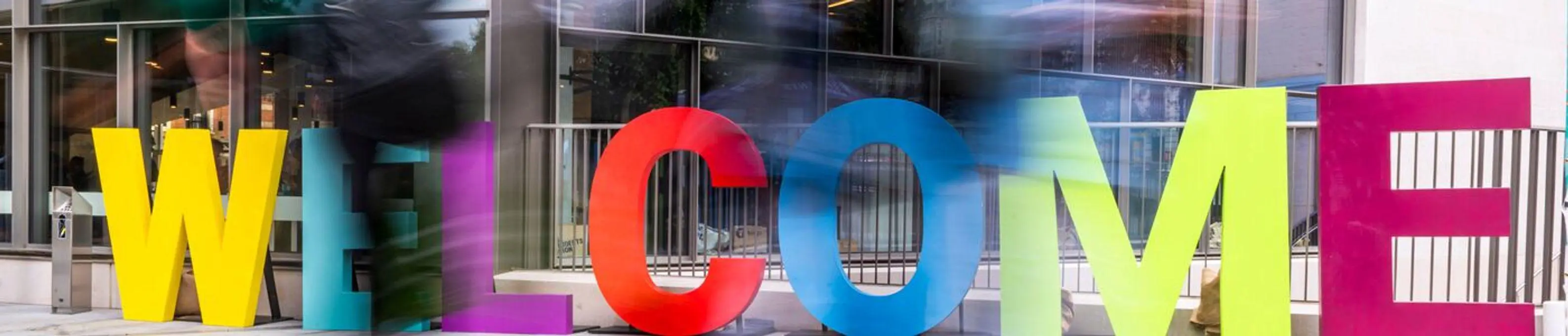 Large colourful letters spelling Welcome