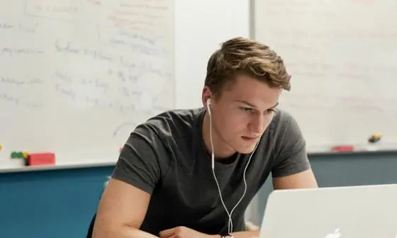 Male Student at laptop