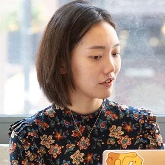 students-on-laptops-marshall-building 1400x300