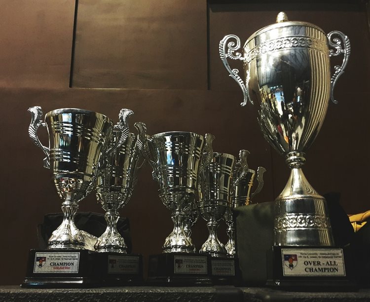 Row of silver trophies
