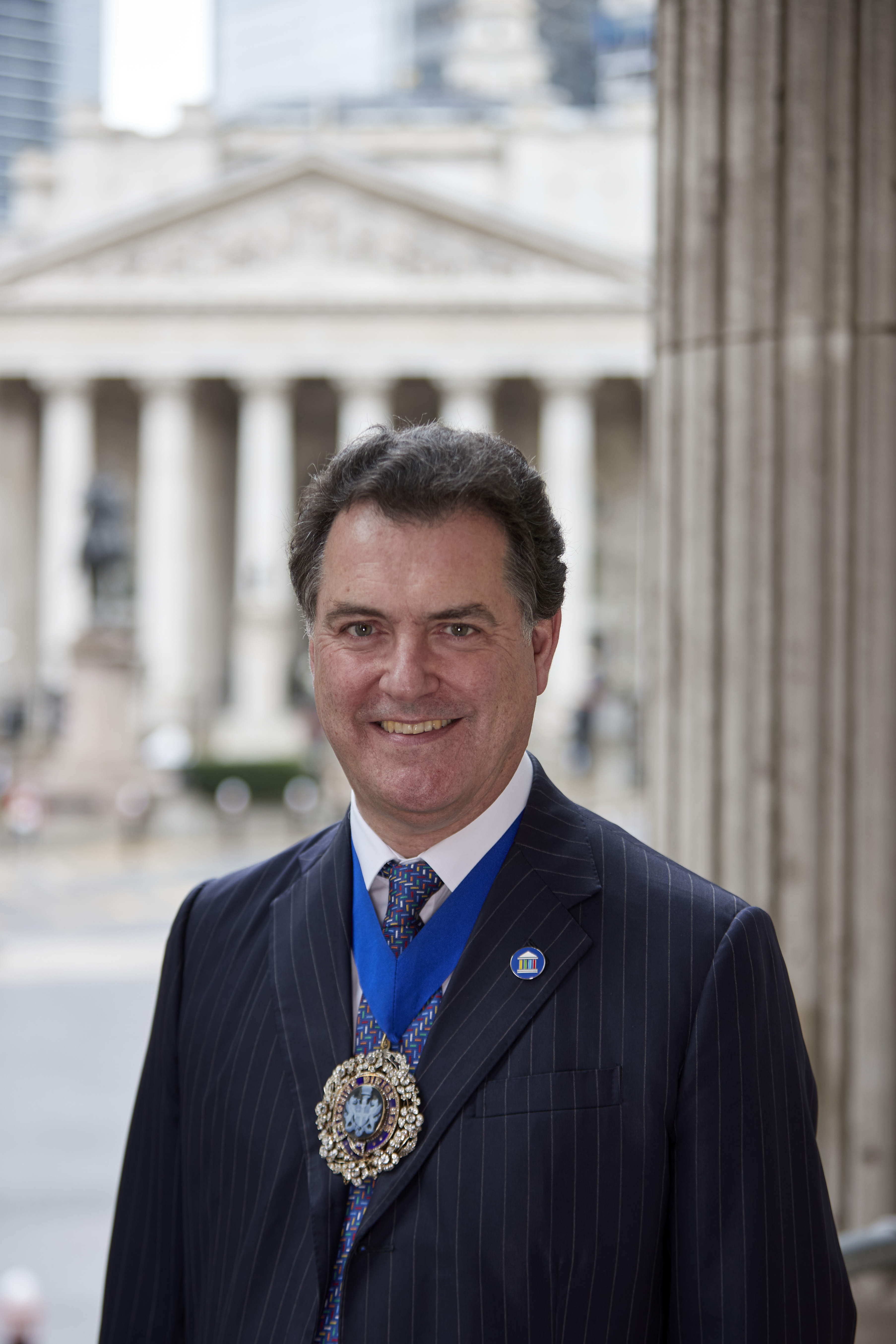 Vincent Keaveny headshot with Badge and TLMA
