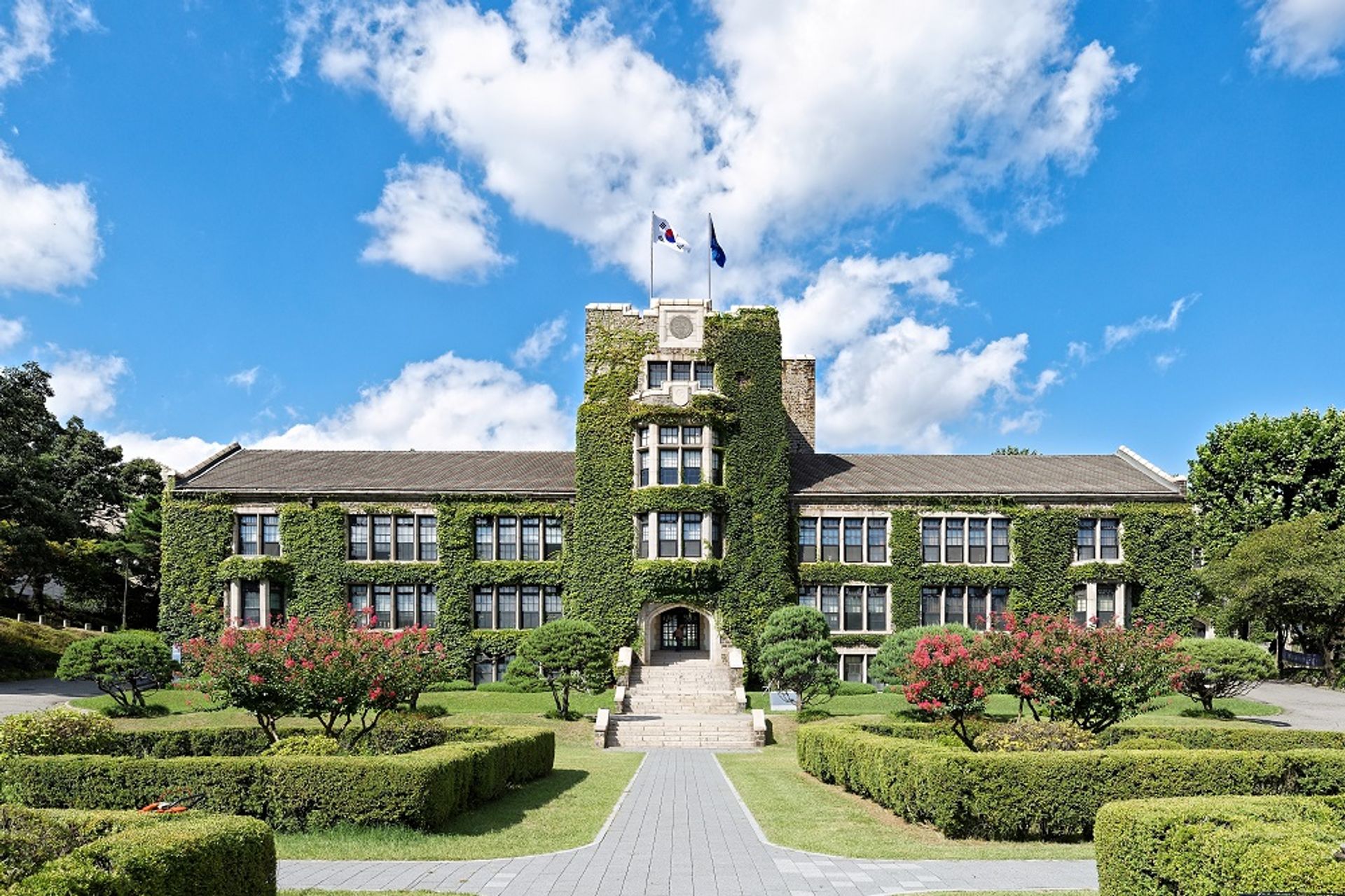 Yonsei University building covered in green ivy on a sunny day