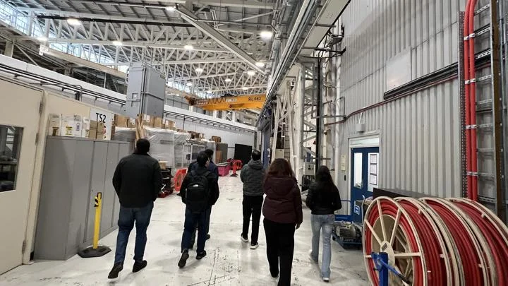 Students walking inside Rutherford Appleton Laboratory