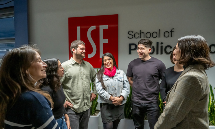 Isabella Luksic talking the six Luksic scholars