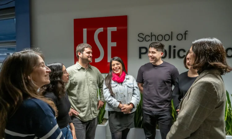 Isabella Luksic talking the six Luksic scholars