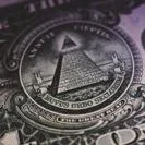 Pyramid and eye symbol on a US dollar bill.