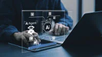 A person working on their laptop with an illustration of an AI agent.