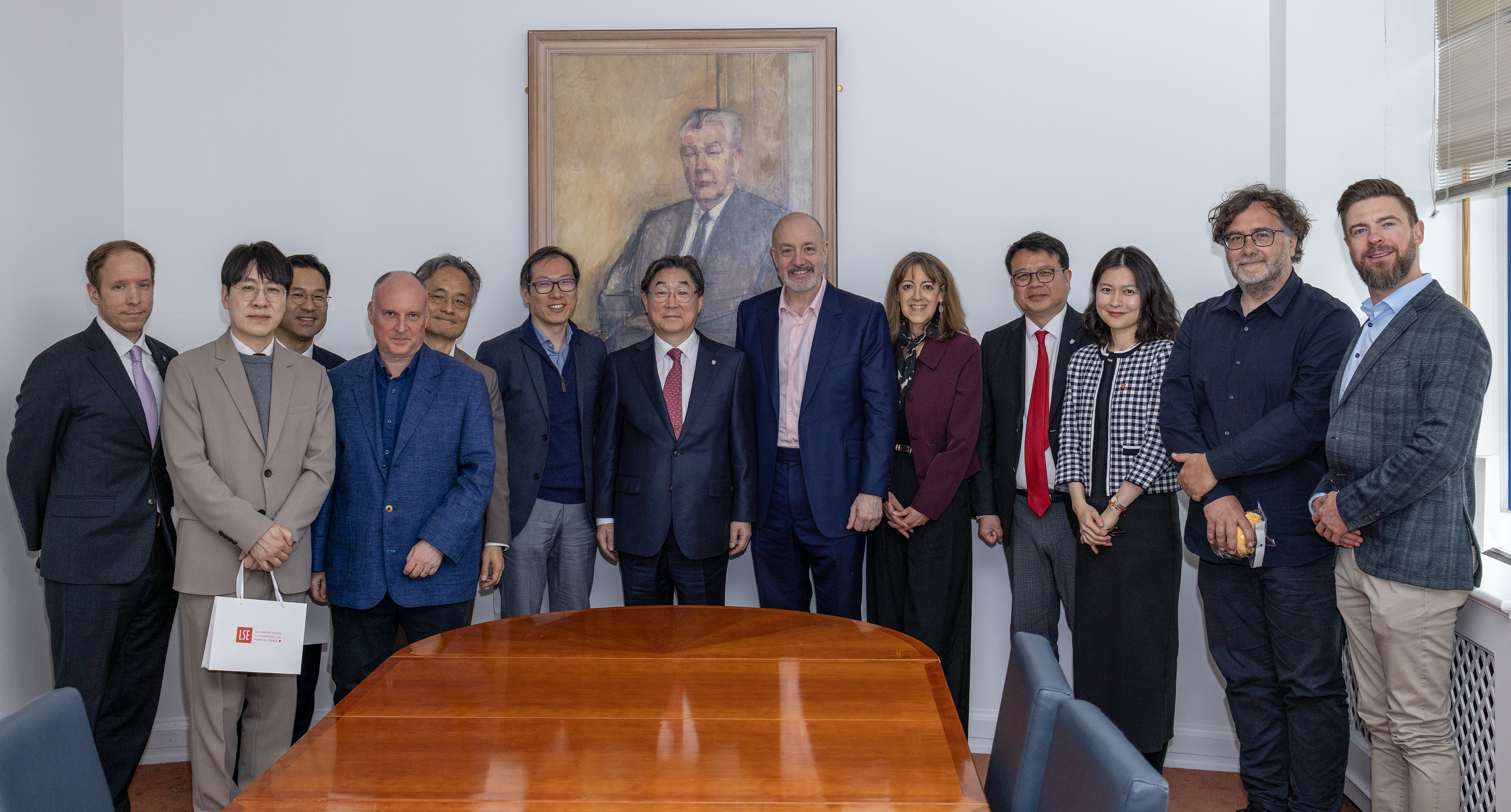 Korea University leadership, LSE President and ISAP staff smiling for group photo